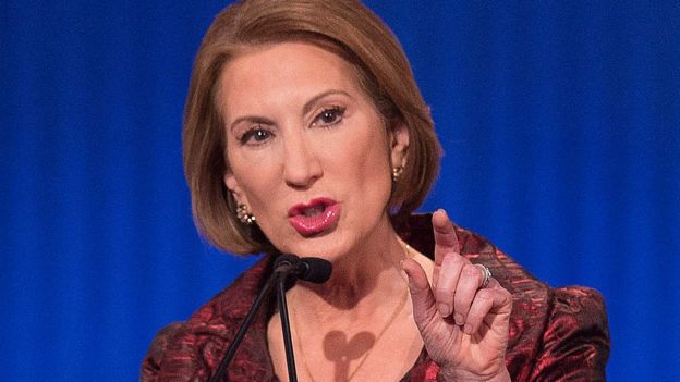 Carly Fiorina talks at a presidential debate in Iowa.