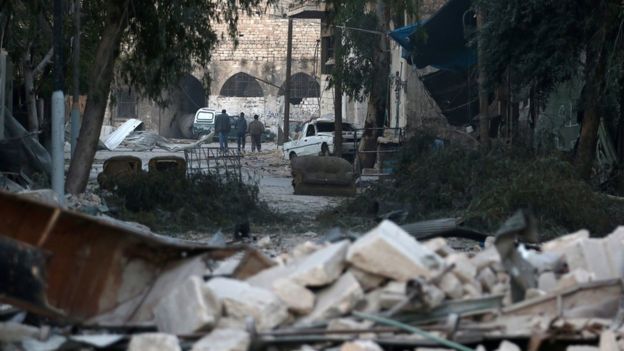 Rubble and abandoned furniture in the streets of eastern Aleppo