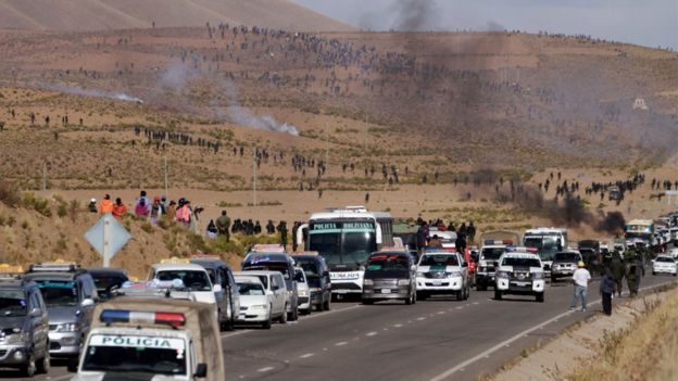 Miners block a highway in Panduro