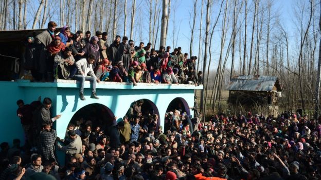 Kashmiri villagers attend the funeral for suspected rebel Shariq Ahmed Bhat at Bandana village of Pulwama district, south of Srinagar, on January 20, 2016.