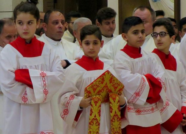 Altar boys and girls at the mass