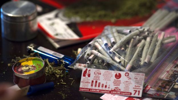 Free joints were passed out to protest a potential crackdown on legalised marijuana in Trump's America