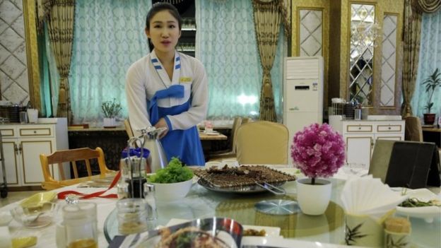 A picture made available on 03 June shows a North Korean waitress at a North Korean restaurant in Beijing city, China, 02 June 2016.