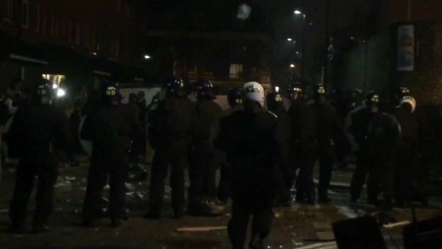 Policemen in riot gear