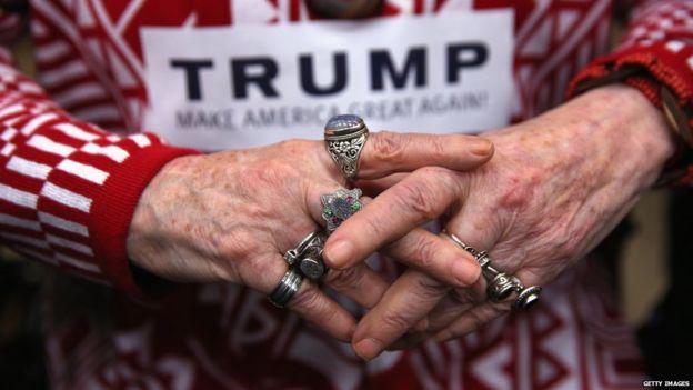 A rally-goer awaits Trumps arrival