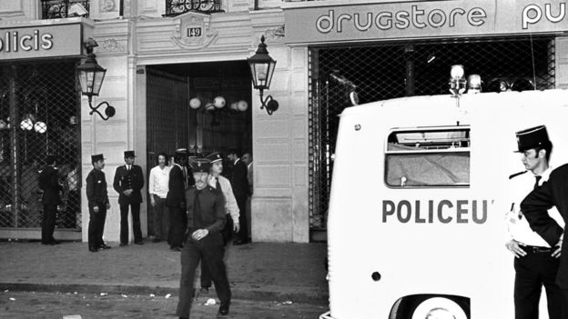 File photo, 15 September 1974 - policemen busy after the attack against the drugstore Publicis in Saint-Germain, Paris