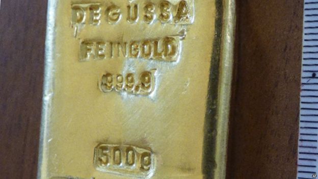 Marks on the gold bar might help identify where it came from