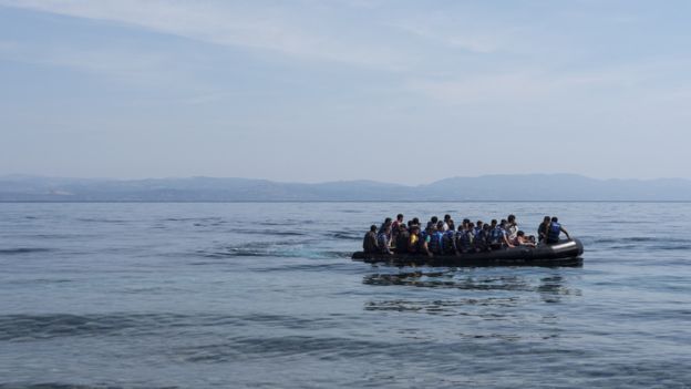 Refugees from Afghanistan arrive in a boat on the shores of Lesbos near Skala Skamnias, Greece on June 2, 2015.