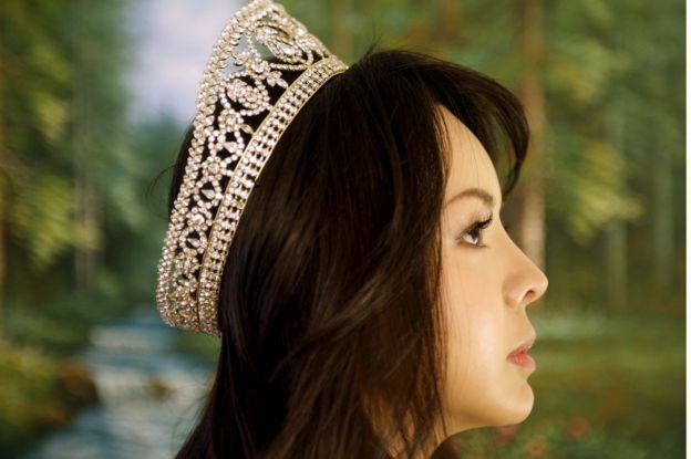 Miss World Canada Anastasia Lin poses with her crown after an interview at her home in Toronto, Canada on 10 November