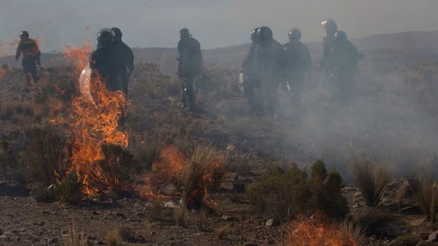 Independent miners clash with the police during protests in Panduro