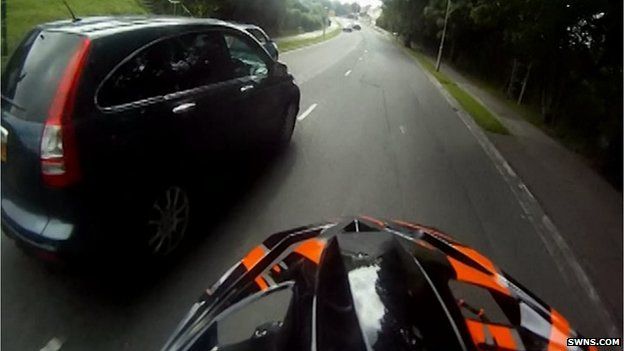 The videos show Lewis Shallcross, 20, from Plymouth, speeding, jumping red lights and pulling wheelies