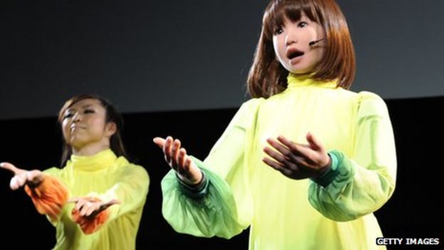 Japan's HRP-4C robot, dancing and singing with live performers in Tokyo