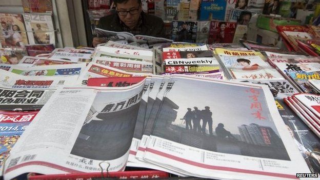 Southern Weekly newspaper copies are left on display at a newsstand in the southern Chinese city of Guangzhou, 7 January 2014.