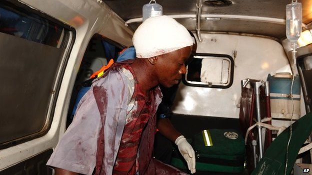 Injured man after grenade attack in Nairobi, Dec 2013