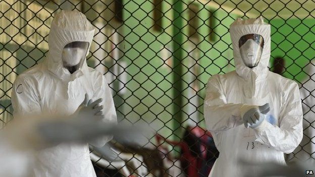 Ebola healthcare workers are trained on ways to treat infected patients at the Siaka Stevens Stadium in Freetown, Sierra Leone, 12 November 2014