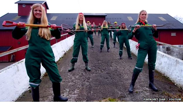 Norwegian girls do dance routines using rakes