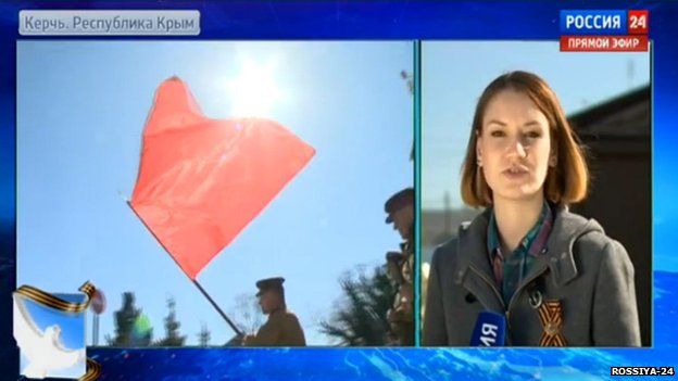 Man with a red flag shown on Russian TV