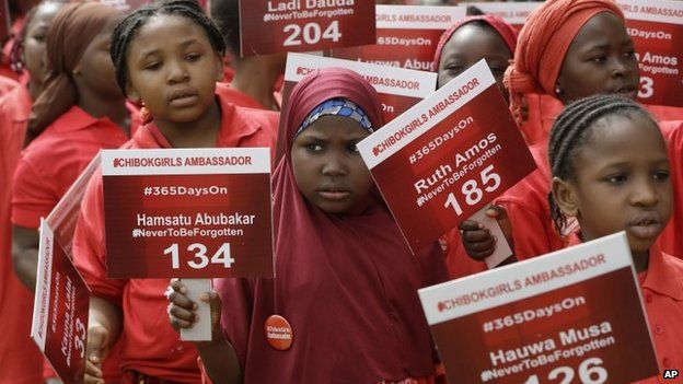 Young girls known as Chibok Ambassadors carry placards bearing the names of the girls kidnapped from the government secondary school in Chibok a year ago, during a demonstration in Abuja, Nigeria, 14 April 2015