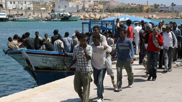 Eritrean migrants arrive in the port of Italy's southern island of Lampedusa