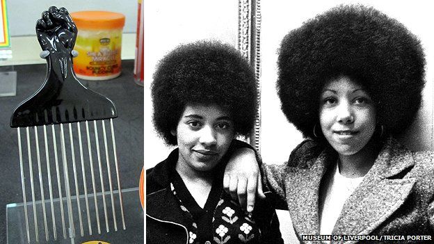 black power fist comb and two girls with massive afros