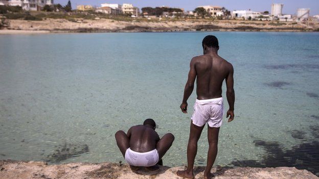 Two Nigerians by the sea in Lampedusa, Italy - Wednesday 22 April 2015