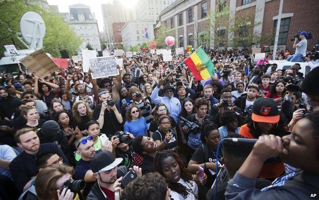 People gathered outside Baltimore's City Hall