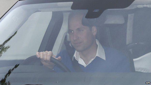 Duke of Cambridge drives away from Lindo Wing of St Mary's Hospital with his newly-born baby daughter