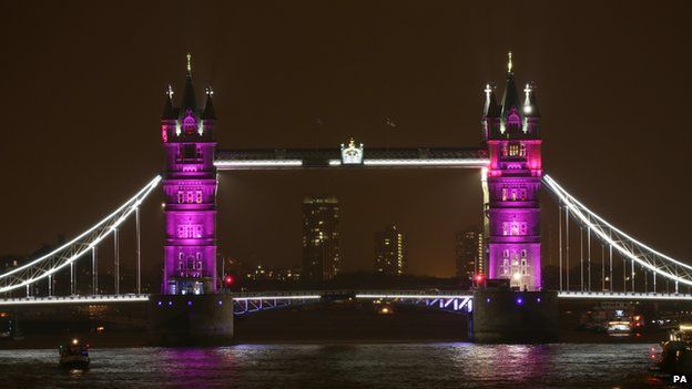Tower Bridge lit in pink to mark the royal birth