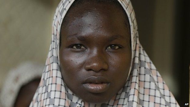 Salamatu Bulama, a lady who claims that Islamist exremists stoned her and others before she was rescued by Nigerian soldiers, as she sits in a clinic at a camp in Yola, Nigeria Sunday, 3 May 2015.