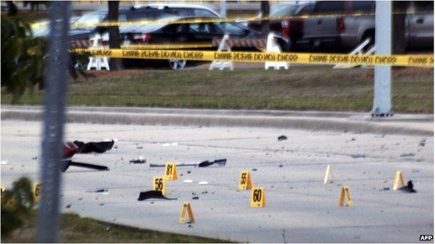 Debris of car blown up as a precaution at scene of attack in Garland, Texas, 4 May 2015