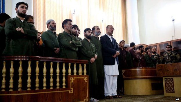 Defendants attend their trial at the Primary Court in Kabul, Afghanistan