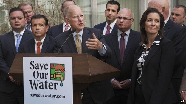 Governor Jerry Brown talks during a news conference after meeting with several California mayors to discuss water conservation at the Capitol in Sacramento, California 28 April 2015
