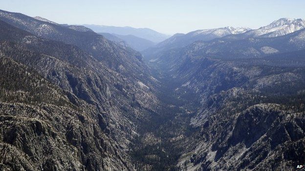 A valley in the Sequoia National Park normally covered in snow this time of year is seen during an aerial survey of the snowpack done by the Californian Department of Water Resources, 28 April 2015