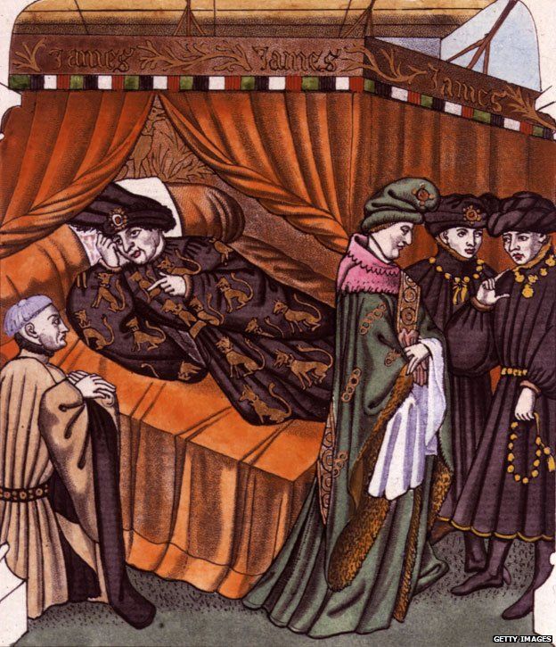 Circa 1400, Charles VI, King of France, is attended in his bedchamber by servants and ministers