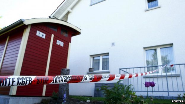 A police ribbon is seen in front of a house in Wuerenlingen, Switzerland 10 May 2015.
