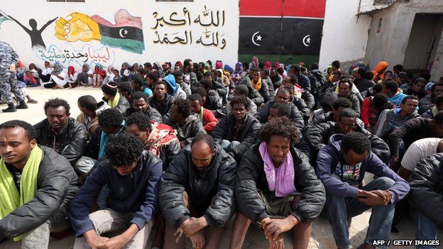 Migrants disembark from a boat after the Libyan coastguard intercepted a boat with African migrants trying to reach Europe at the port in the city of Misrata east of Tripoli, Libya, 03 May 2015