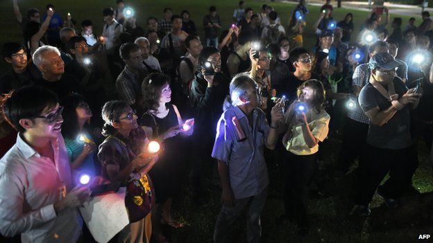 Supporters gather at the speaker's corner during a vigil for 16-year-old student Amos Yee who is in prison in Singapore on 11 May 2015