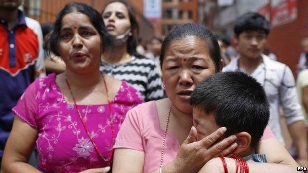 Nepalese run for open space as a strong earthquake hits Kathmandu, Nepal, 12 May 2015.