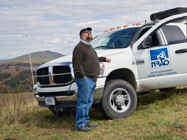 Chuck Niday with a white truck