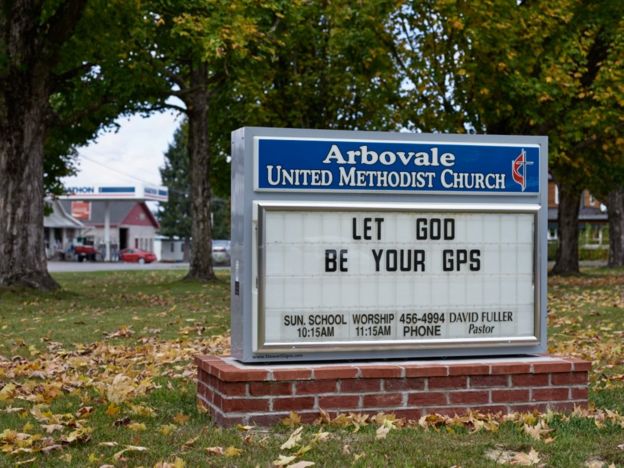 Sign reading "Let God be your GPS"