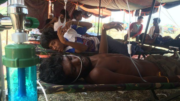 Migrants treated in makeshift clinic in Langsa, Indonesia. 17 May 2015