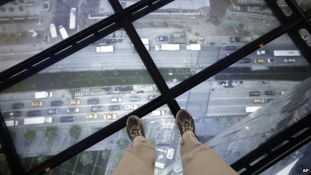 A view through the Sky Portal shows a live video view of the streets below from One World Observatory, Wednesday, May 20, 2015, in New York