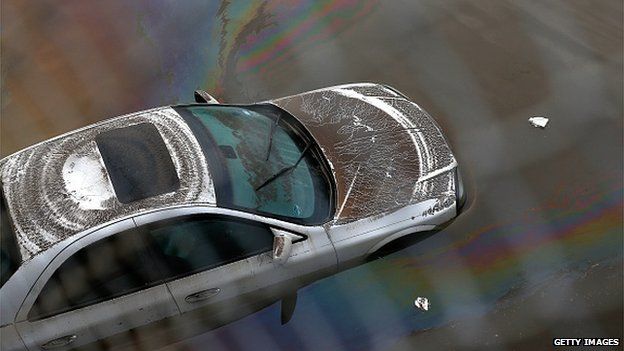 Car in floodwaters nearby Houston