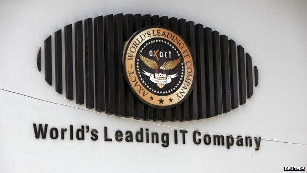 The logo of Pakistani software company Axact is seen on its office wall in Karachi (27 May 2015)