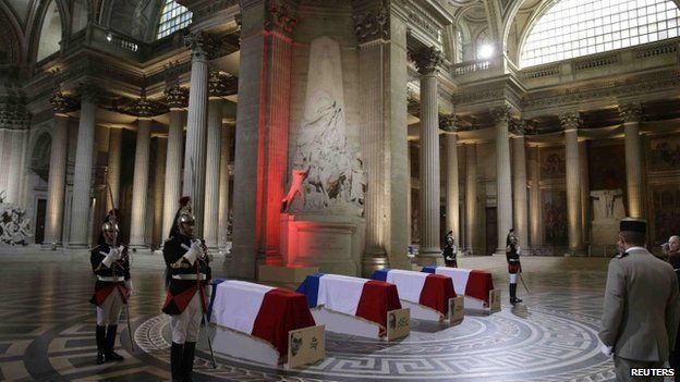 Four flag-draped coffins are seen inside the Pantheon during a ceremony in Paris, France, May 27, 2015.