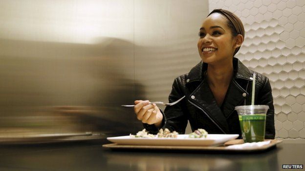 Miss Universe Japan Ariana Miyamoto lunches before her workout at a gym in Tokyo April 1, 2015