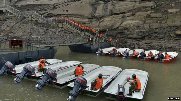 Paramilitary policemen assemble to get ready to travel to Hubei province for rescue operations after a ship sank in the Jianli section of the Yangtze River, at a port in Chongqing, 2 June 2015.