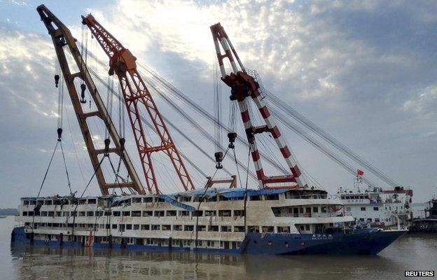 The capsized cruise ship Eastern Star is seen pulled out of the Yangtze River, in Jianli, Hubei province, China, June 5, 2015
