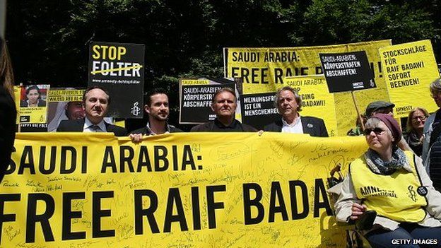 Amnesty International activists held a protest demanding the release of blogger Raif Badawi in front of the Saudi Arabian embassy in Berlin on 22 May 2015