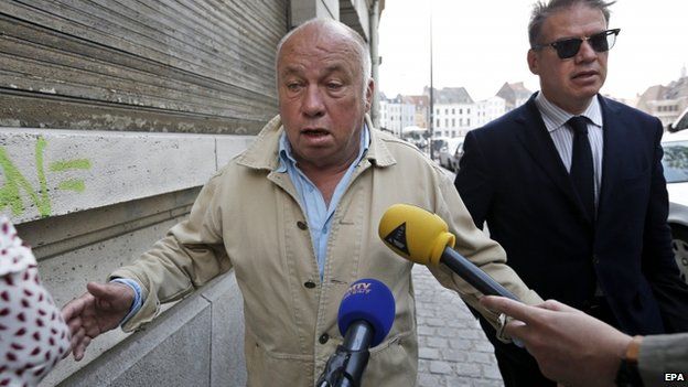Belgium-based French brothel owner Dominique Alderweireld (L), aka "Dodo La Saumure", arrives at the Court House on 12 June 2015.